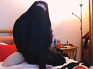 Arab Milf Wearing Hijab Rides Dildo